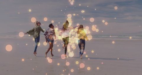 Four women running barefoot on beach with dreamy bokeh lights, carefree group lifestyle