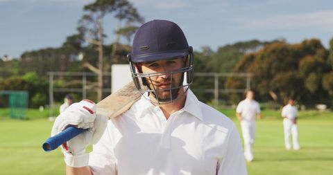Cricket Player with Bat on Field During Game - Download Free Stock Images Pikwizard.com