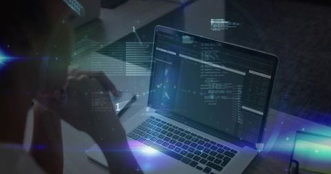 Developer Coding on Laptop with Holographic HUD Overlay in Blue Home Workspace at Desk