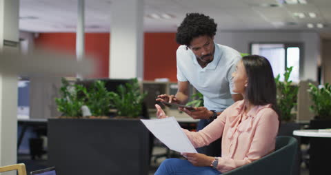 Casual Team Discussion in Modern Workspace