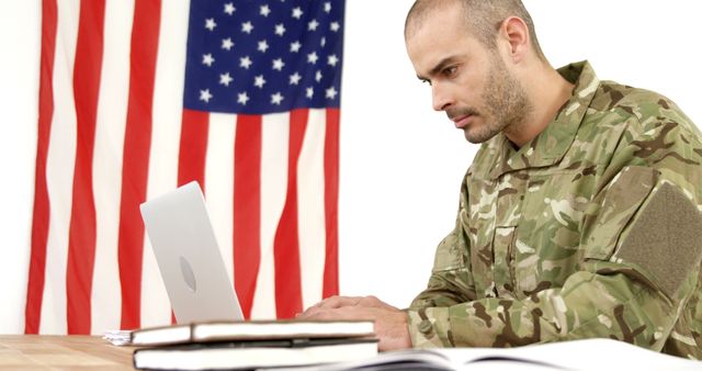 Soldier Working on Laptop by American Flag - Download Free Stock Images Pikwizard.com