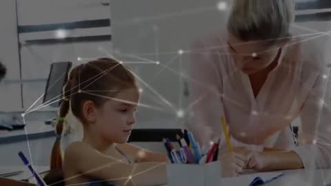 Teacher Guiding Student with Digital Network Theme in Classroom