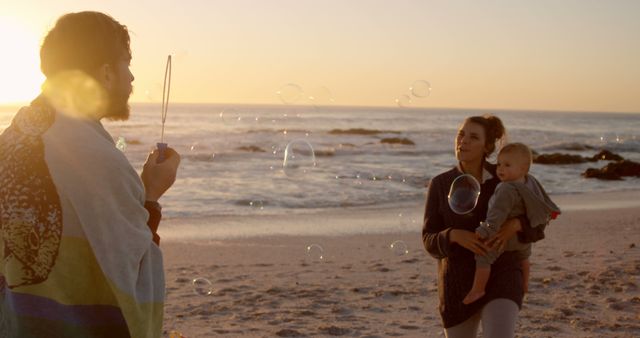 Family Enjoying Sunset at Beach with Bubbles - Download Free Stock Images Pikwizard.com