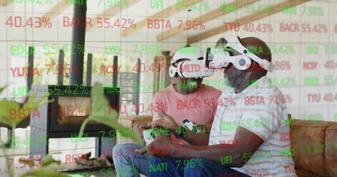 Intergenerational Father and Son Wearing VR Headsets Playing Game with Stock Ticker Overlay