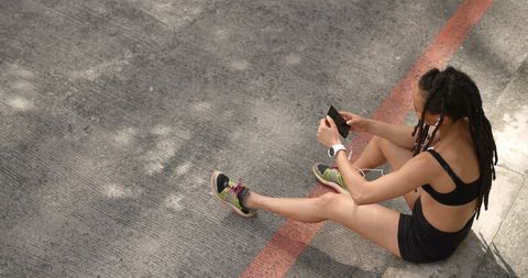 Young Woman with Headphones Using Smartphone Outdoors - Download Free Stock Images Pikwizard.com