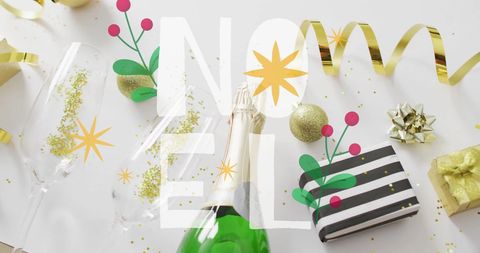 Noel Lettering with Christmas Decorations Champagne and Gifts