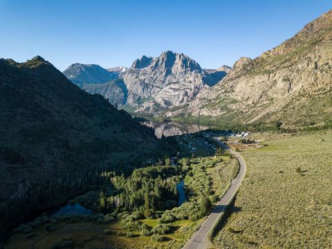 Aerial View of Mountain Landscape and Winding Road