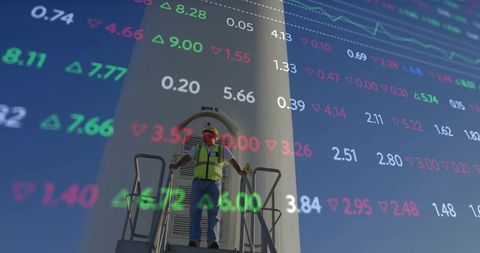 Wind Turbine Technician on Tower with Stock Market Overlay