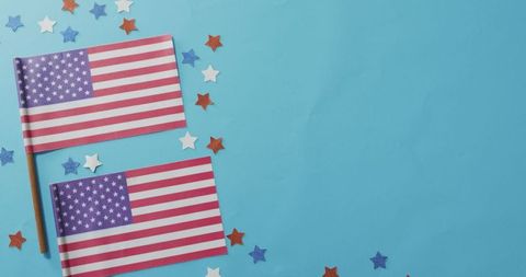 American Flags and Stars on Bright Blue Background