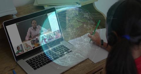 Child learning online at home desk with headset writing notebook, global network overlay