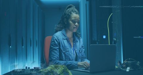 Female IT Specialist Managing Data Servers in Modern Technology Room - Download Free Stock Images Pikwizard.com