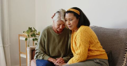 Diverse Female Companionship and Emotional Support on Cozy Sofa