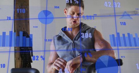 Mid-adult man checking smartwatch during cardio training with fitness analytics overlay
