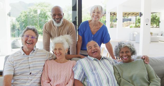 Happy Multiracial Group of Senior Friends Enjoying Time Together at Home - Download Free Stock Images Pikwizard.com