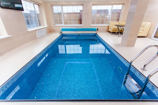 Indoor Luxury Swimming Pool with Modern Amenities - Download Free Stock Photos Pikwizard.com