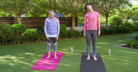 asian women practicing yoga outdoors for relaxation and wellness - Download Free Stock Images Pikwizard.com