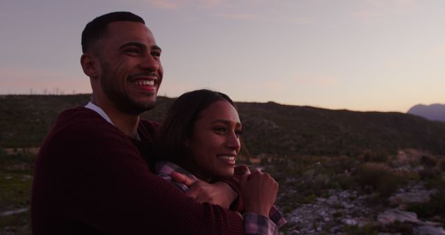 Happy couple embracing outdoors at sunset - Download Free Stock Images Pikwizard.com