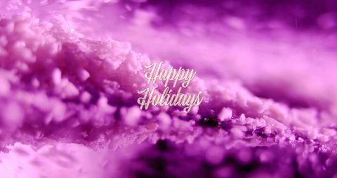 Happy holidays greeting with falling purple particles