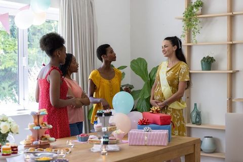 Diverse Group of Women Celebrating at a Cozy Baby Shower