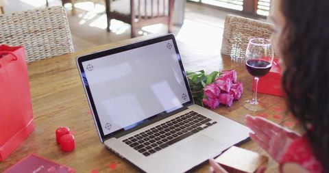 Romantic Valentine's Day Video Call with Gifts on Wooden Table