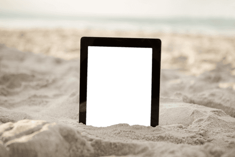 Transparent Digital Tablet on Sandy Beach Background - Download Free Stock Videos Pikwizard.com