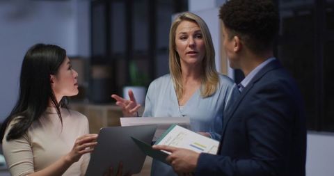 Diverse Business Team Collaborating in Modern Office Ambiance