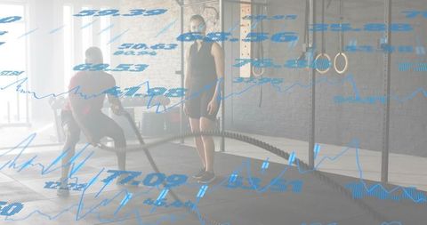 Trainer monitoring athlete using battle ropes with digital fitness data overlay