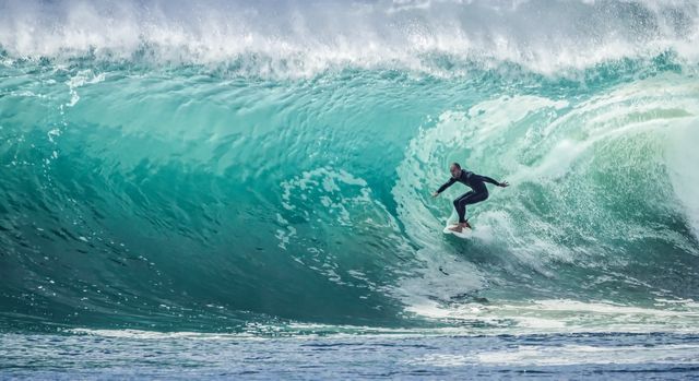 Surfer Riding Massive Ocean Wave - Download Free Stock Photos Pikwizard.com