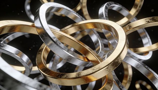 Interlocking Gold and Silver Rings Forming Reflective Metallic Torus Cluster