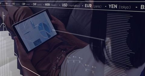 Executive Analyzing Financial Charts on Tablet with Currency Ticker Overlay