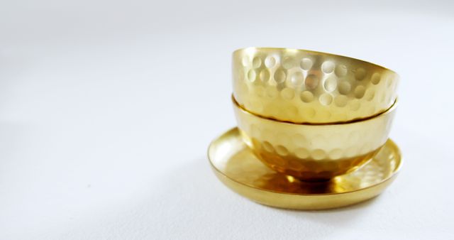 Stacked Golden Bowls with Decorative Hammered Texture on White Background - Download Free Stock Images Pikwizard.com