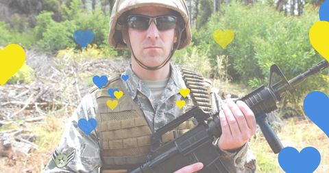 Caucasian Soldier with Yellow and Blue Hearts Symbolizing Ukraine Solidarity