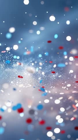 Vertical abstract confetti particles drifting over blue bokeh with sparkling light orbs