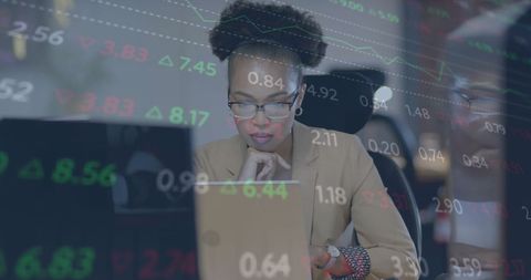 Focused African American Businesswoman Analyzing Financial Data