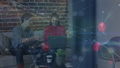 Diverse Professionals Discussing Data with Network Overlay