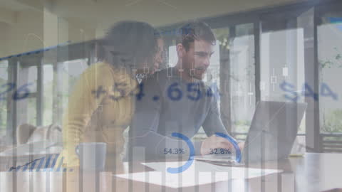 Business Couple Analyzing Data on Laptop with Overlay Graphics