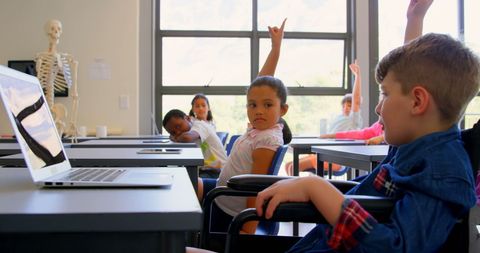 Diverse kids engaged in classroom learning environment