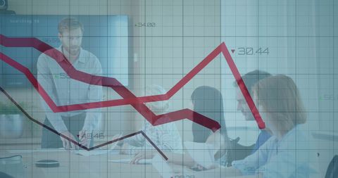 Business team analyzing statistics with digital graph overlay