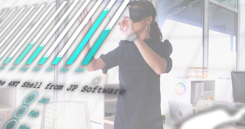 Woman wearing vr headset manipulating floating data charts in modern open workspace