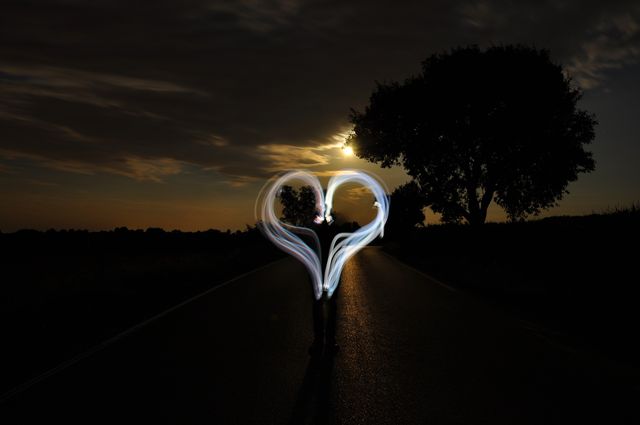 This image can be ideal for conveying themes of love, romance, creativity, and evening ambiance. Perfect for use in greeting cards, romantic-themed campaigns, event invitations, or artistic projects. It can also serve as a background for motivational posters or other art projects that seek to illustrate moods or emotions connected with twilight and creativity.