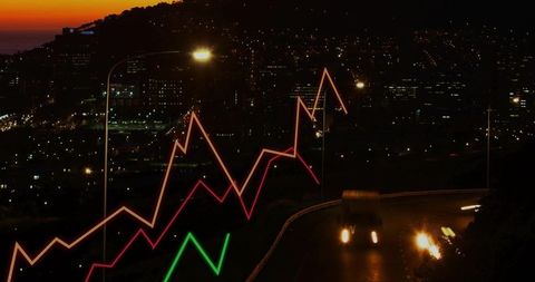 Commercial truck driving at dusk with superimposed graphs over city