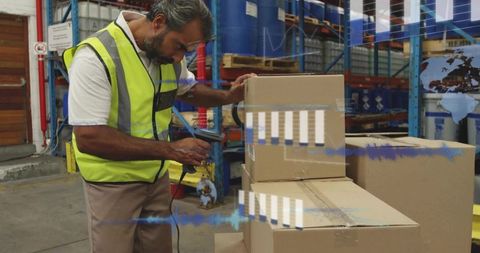 Warehouse worker scanning boxes updating inventory with handheld barcode scanner and ar