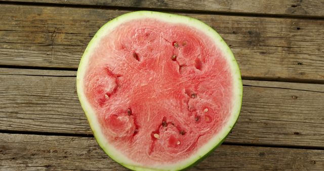 Close-up of Rotten Watermelon on Wooden Surface - Download Free Stock Images Pikwizard.com