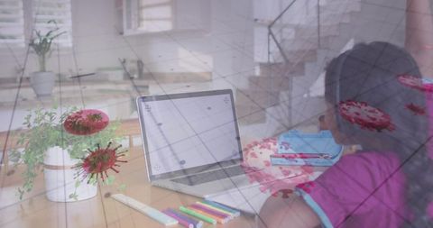Girl engaging in art projects at home with laptop companionship