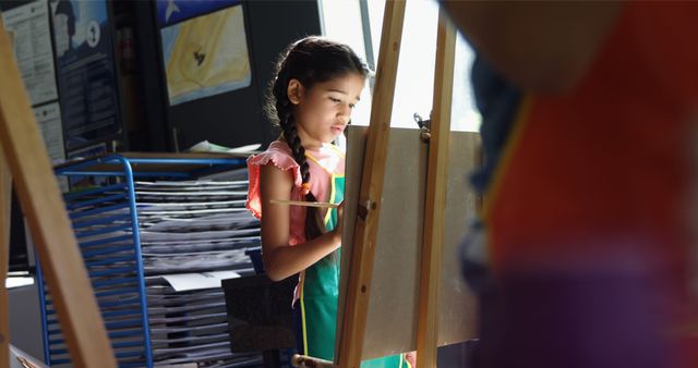 Girl Concentrating on Artwork in Classroom Studio - Download Free Stock Images Pikwizard.com