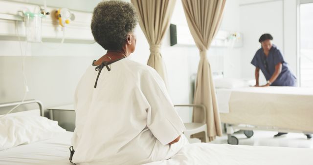 Elderly Patient Sitting on Hospital Bed with Nurse - Download Free Stock Images Pikwizard.com