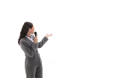 Businesswoman Making Presentation with Microphone