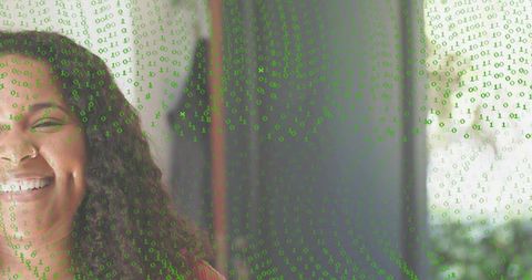 Smiling mid-adult woman wearing red top with green binary overlay, tech portrait, copy space