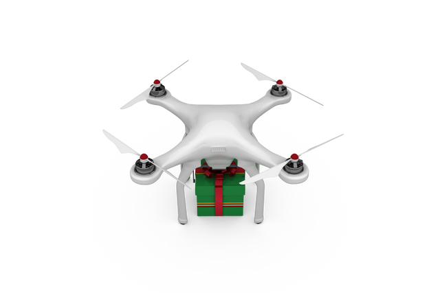 Quadcopter Drone Carrying Green Gift Box With Red Ribbon Over Transparent Background - Download Free Stock Videos Pikwizard.com