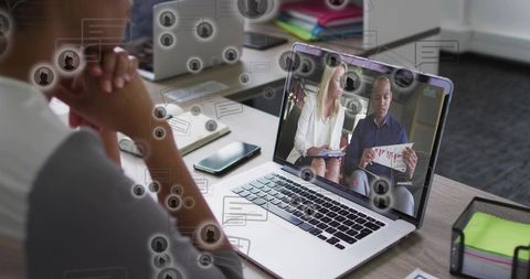 Remote team collaboration and virtual presentation with viewer watching webinar on laptop